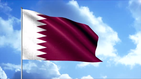 Flag of Qatar Against Background of Clouds Floating on the Blue Sky