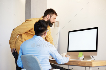 Young business team working with new startup project modern coworking office. / Photodune, Misc