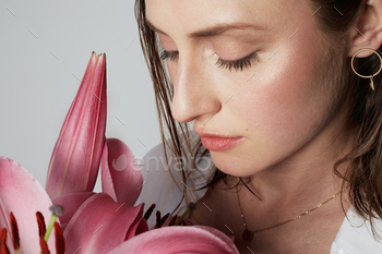 Portrait of beautifull young femle with natural makeup over white background. / Photodune, Misc
