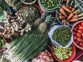 bles and fruits for sale in a street. Short circuit production at Hue Market