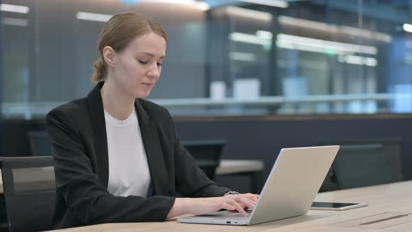 Woman Closing Laptop Standing Up Going Away