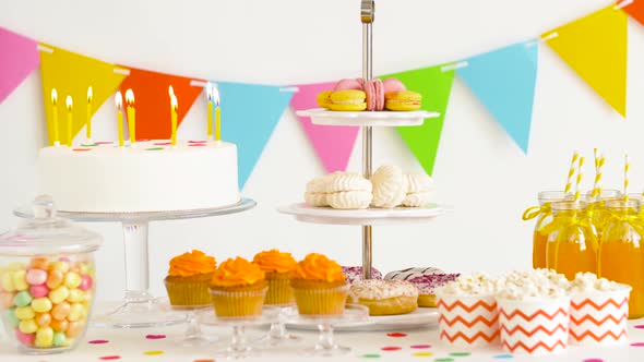 Food and Drinks on Table at Birthday Party