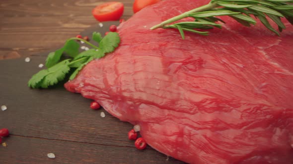 Raw Beef Fillet Meat on Wooden Board Close Up