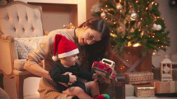 Playing with Toy Car in Christmas