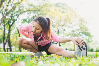Healthy young asian woman exercising at park. / Photodune, Misc