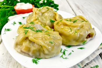 Manty with dill in dish on board / Photodune, Misc