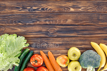 top view of fresh healthy fruits and vegetables on wooden table / Photodune, Misc