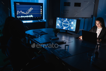 Trader team making blockchain research inside hedge fund office - Soft focus on woman face / Photodune, Misc