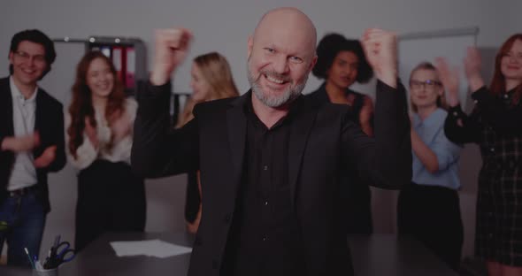 Confident Colleagues Standing in Office