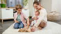 Happy mother with her little sons playing games on floor in living room. Parenting, children - PhotoDune Item for Sale