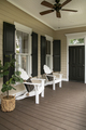 Charleston style porch with chairs and entry door on southern home - PhotoDune Item for Sale