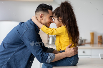 Happy Father's Day. Cute Little Arab Girl Embracing Her Happy Dad / Photodune, Misc