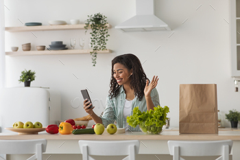Online call, prepare salad with organic vegetables for lunch, delivery of grocery home, covid-19 / Photodune, Misc