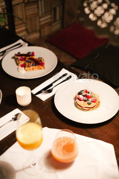 Family mother father and child have Breakfast in the cafe. Nutrition Concept. / Photodune, Misc