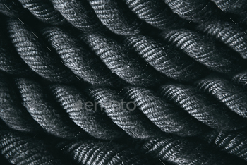 Close up of black battle rope for functional training. Sport and fitness equipment. / Photodune, Misc