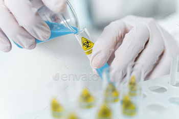 Close up of scientist that making pharmacy / Photodune, Misc