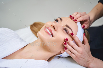 Happy girl during beauty procedures stock photo / Photodune, Misc