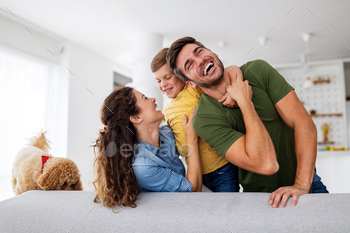 Happy family having fun time at home / Photodune, Misc