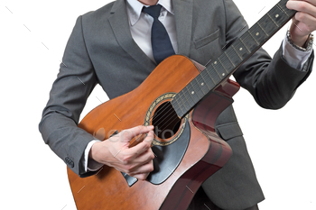 Businessman playing acoustic guitar isolated on white background. / Photodune, Misc