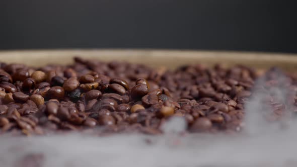 Burlap Sack Full Coffee Beans on Dark Background Closeup