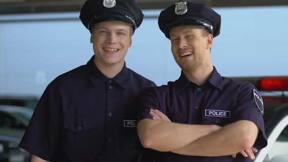 Two Mates in Police Uniform and Cap Smiling, Looking Into Camera, Trainees