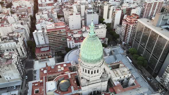 Aerial high angle of Argentine Congress Palace green bronze dome surrounded by Buenos Aires building