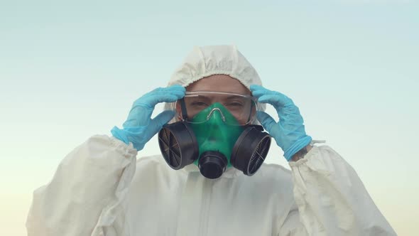 Portrait of Female Scientists Taking off Mask