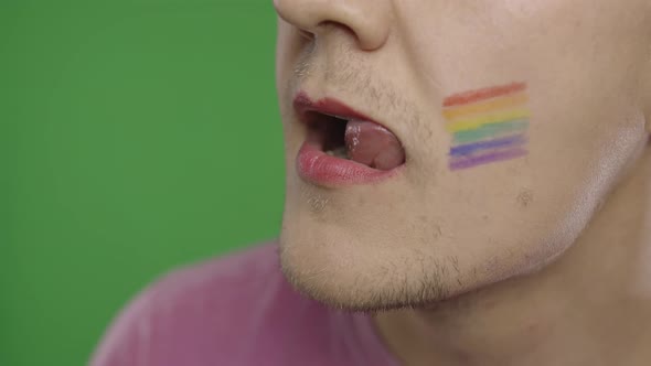 Bearded Man with Painted Lips Licks Them Sexually. LGBT Community. Transsexual