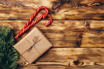 Beautiful wrapped Christmas gifts on wooden background / Photodune, Misc