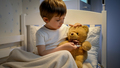 Portrait of cute sick boy measuring temperature to his toy teddy bear with digital thermometer - PhotoDune Item for Sale