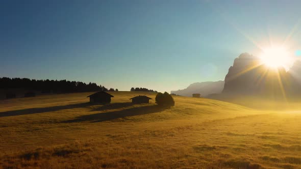 Autumn Morning and Bright Misty Sunrise in the Valley of Compaccio. Province of Bolzano, Italian