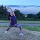 A Young European Woman Exercises Yoga in the Park in the Summer.  - VideoHive Item for Sale