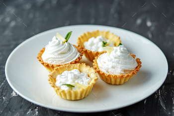 Delicate Cream Cakes. The concept of food, desserts / Photodune, Misc