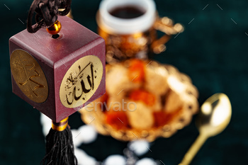 Muslim amulet of bordeux color on rope / Photodune, Misc