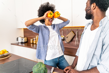 Afro american couple cooking at home / Photodune, Misc
