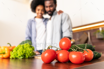 Afro american couple cooking at home / Photodune, Misc