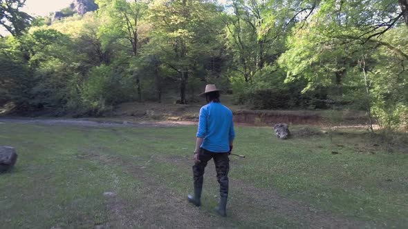 Fisherman in Forest