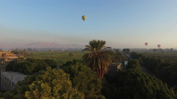 Hot air ballooning over the Luxor and Nile river.