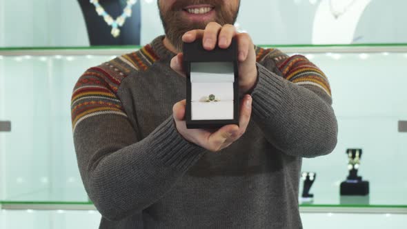 Selective Ficus on a Engagement Ring in a Box Mature Man Is Holding