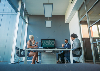 Corporate business team and manager in a meeting / Photodune, Misc