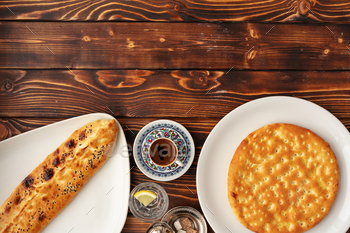 Baked homemade flatbread on wooden background close up / Photodune, Misc