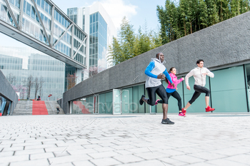 urban runners making sprints in an urban area / Photodune, Misc