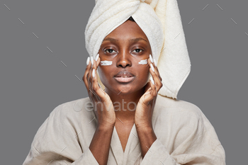 Young African American Woman Enjoying Skin Care / Photodune, Misc
