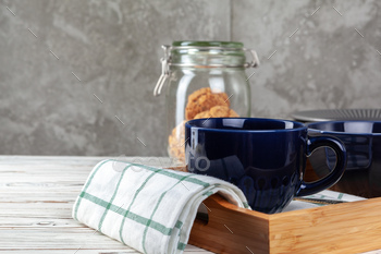 Close up of ceramic tea cup with cookies / Photodune, Misc