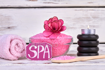 Spa treatment concept. Pink salt with rolled towel and stones. / Photodune, Misc