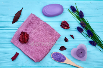 Top view aromatic spa accessories on blue wooden desk. / Photodune, Misc