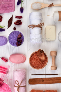 Flat lay bathroom spa accessories on white desk. / Photodune, Misc