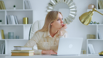 Upset young girl at work in the office. Unhappy young girl / Photodune, Misc