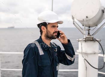 Marine Deck Officer or Chief mate on deck of vessel or ship / Photodune, Misc