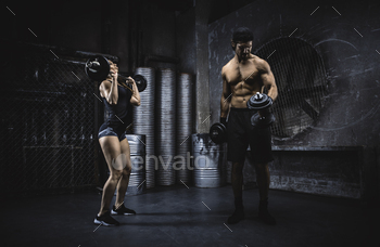 Young people making functional training in the grungy gym / Photodune, Misc